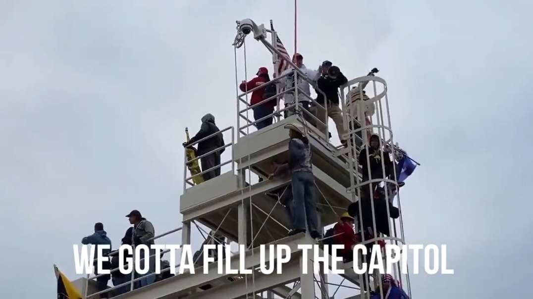 New Video Shows Masked Mystery Man With Megaphone On Scaffold Directing People Into Capitol Jan 6th